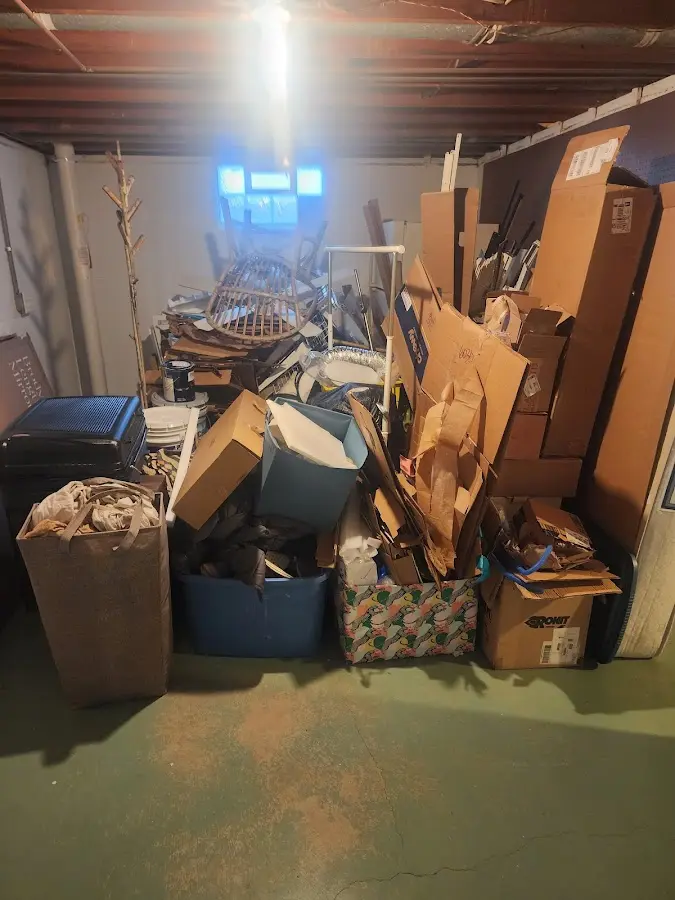 Roll-off dumpster container at job site for 15 Yard Dumpster Rental in Ashland